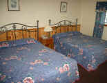 444_motelbed1.jpg (56632 bytes)